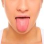 Медики розповіли, про які захворювання свідчить незвичайний колір язика
